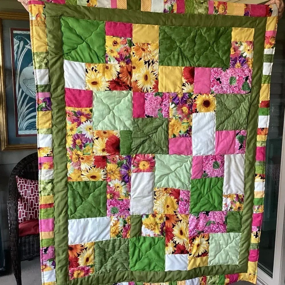 NWT. Hand Crafted Field of Flowers Quilt with Green, Yellow and Pink Accents